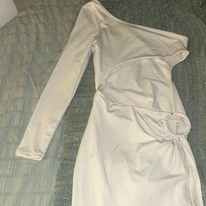 A white dress from the Instagram brand ‘shoppinkplastic’. Size: S